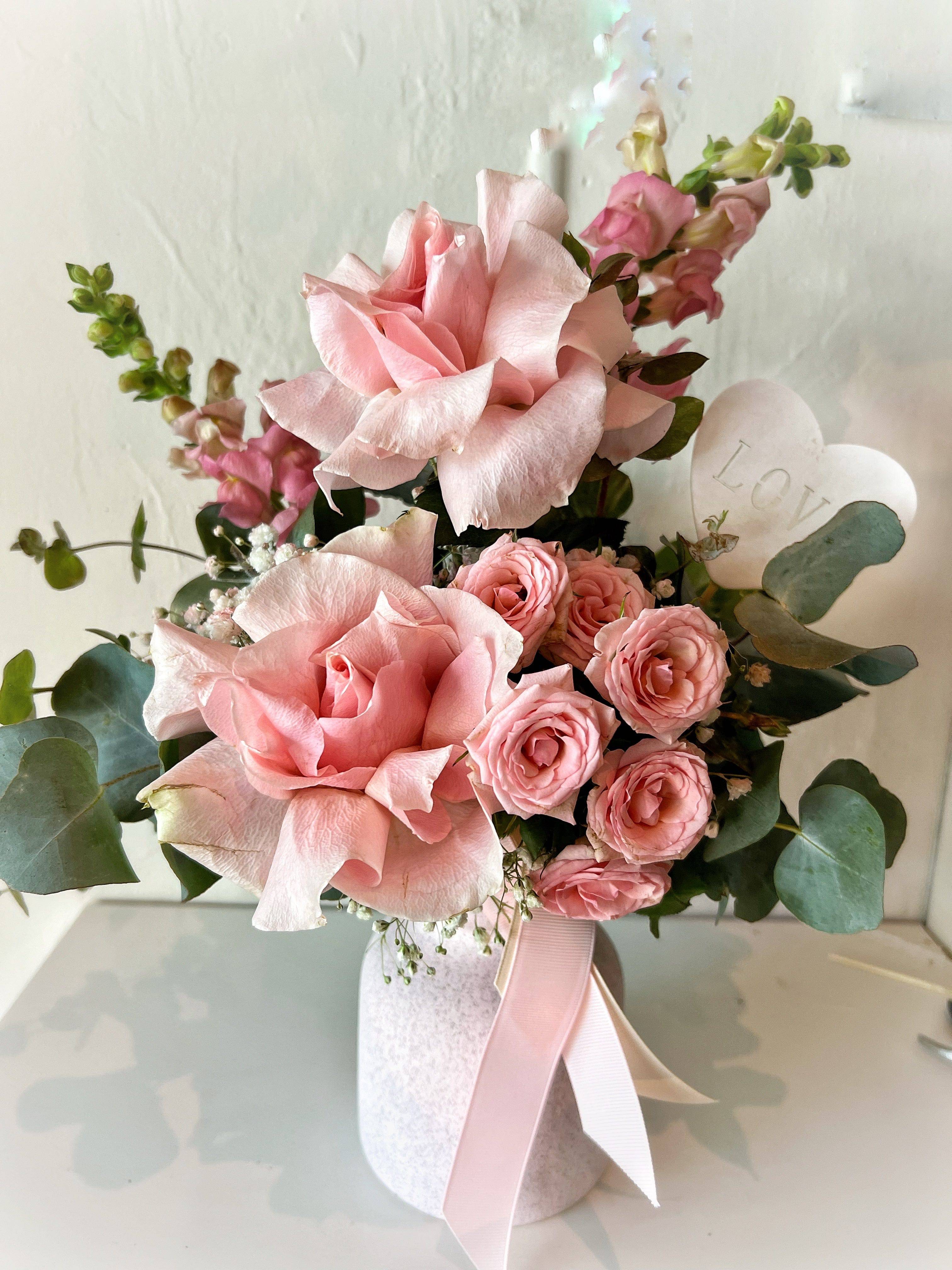 Mon Cheri- Reflexed Pink Rose and Babies Breath Arrangement in a pink ...